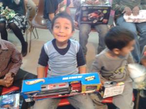 Thanks to all who helped in this years Toy drive!  The look on this boys face says it all!  