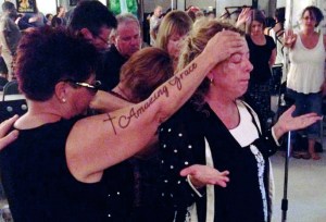 Jane Goodell praying for Kathleen. 