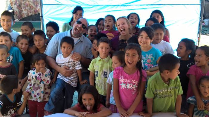 Drs Ron & Mary here with a group of children they just treated. 